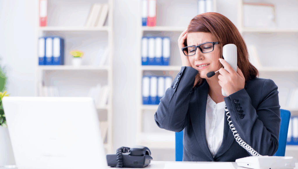 Frustrated telecaller struggling with business to business telemarketing services.