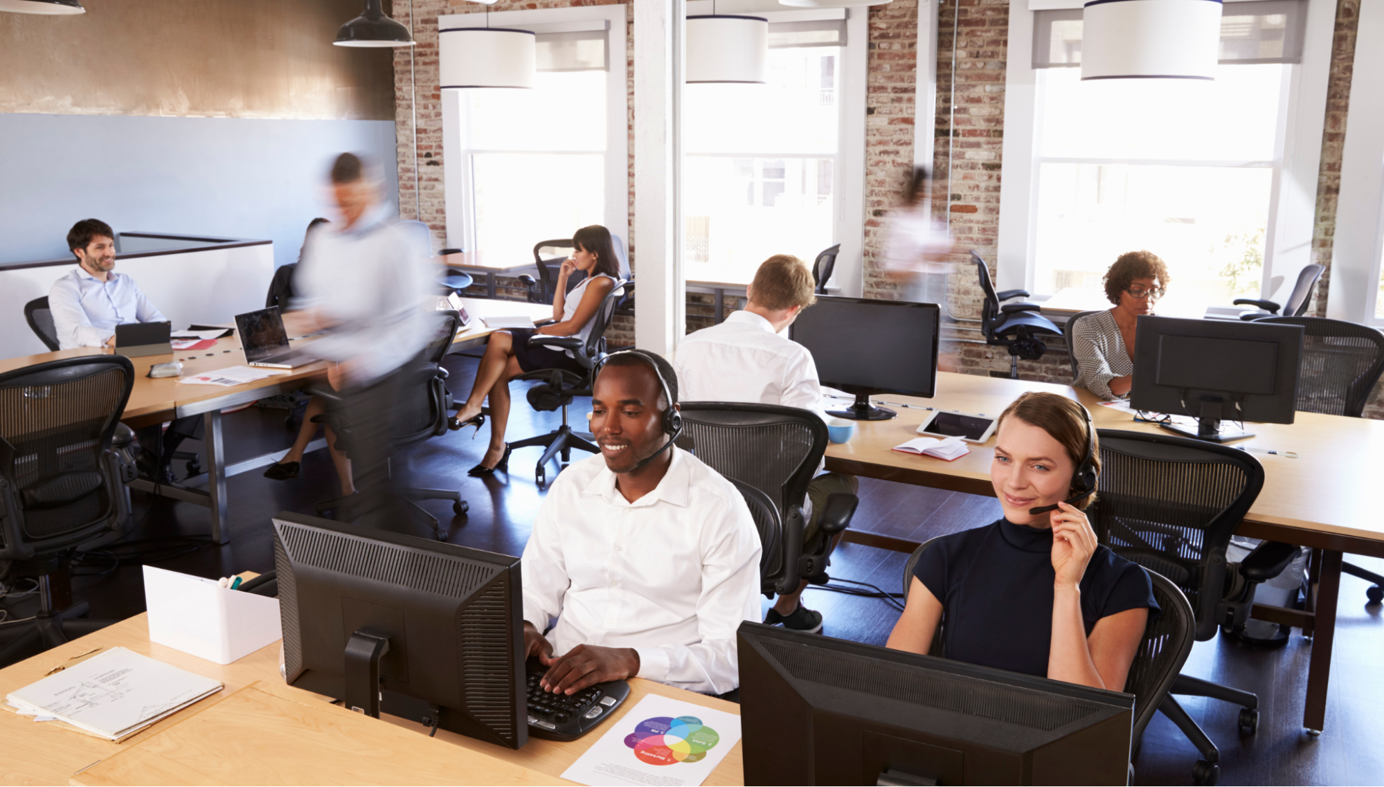 Illustration of agents from an outsourced call center working remotely for different companies.