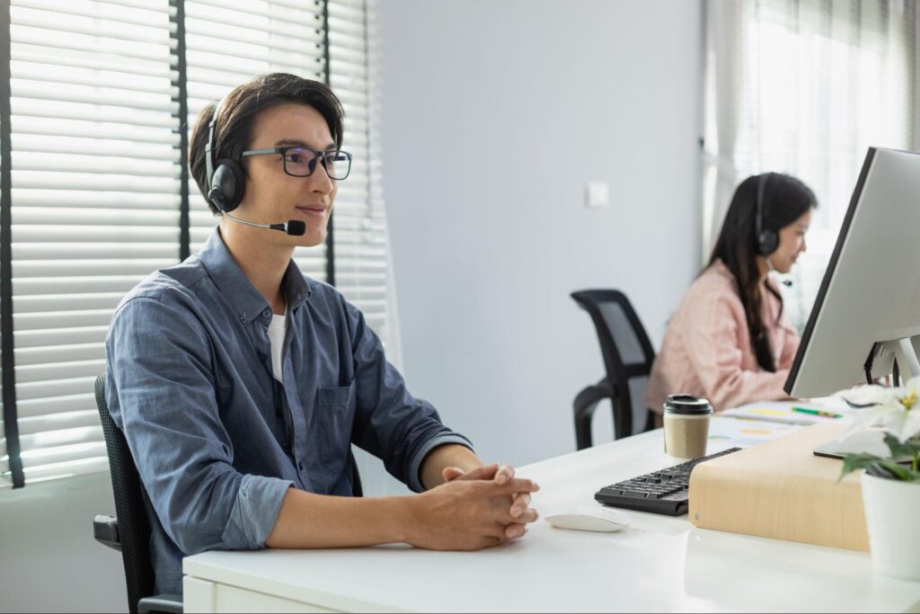 A customer service team helping businesses with outsourcing ecommerce customer support for faster and more efficient customer service.